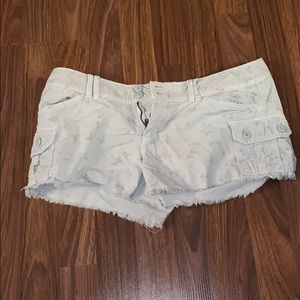 Cream shorts with lightly colored roses